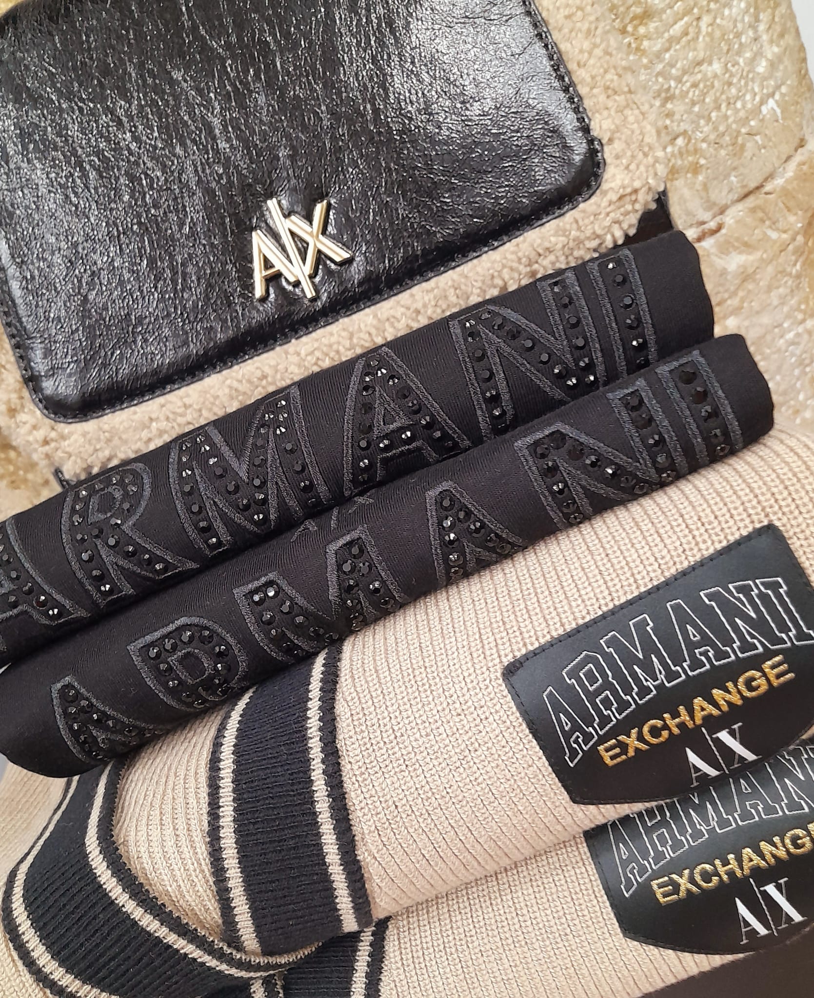 Bolso, camiseta y jersey Armani Exchange